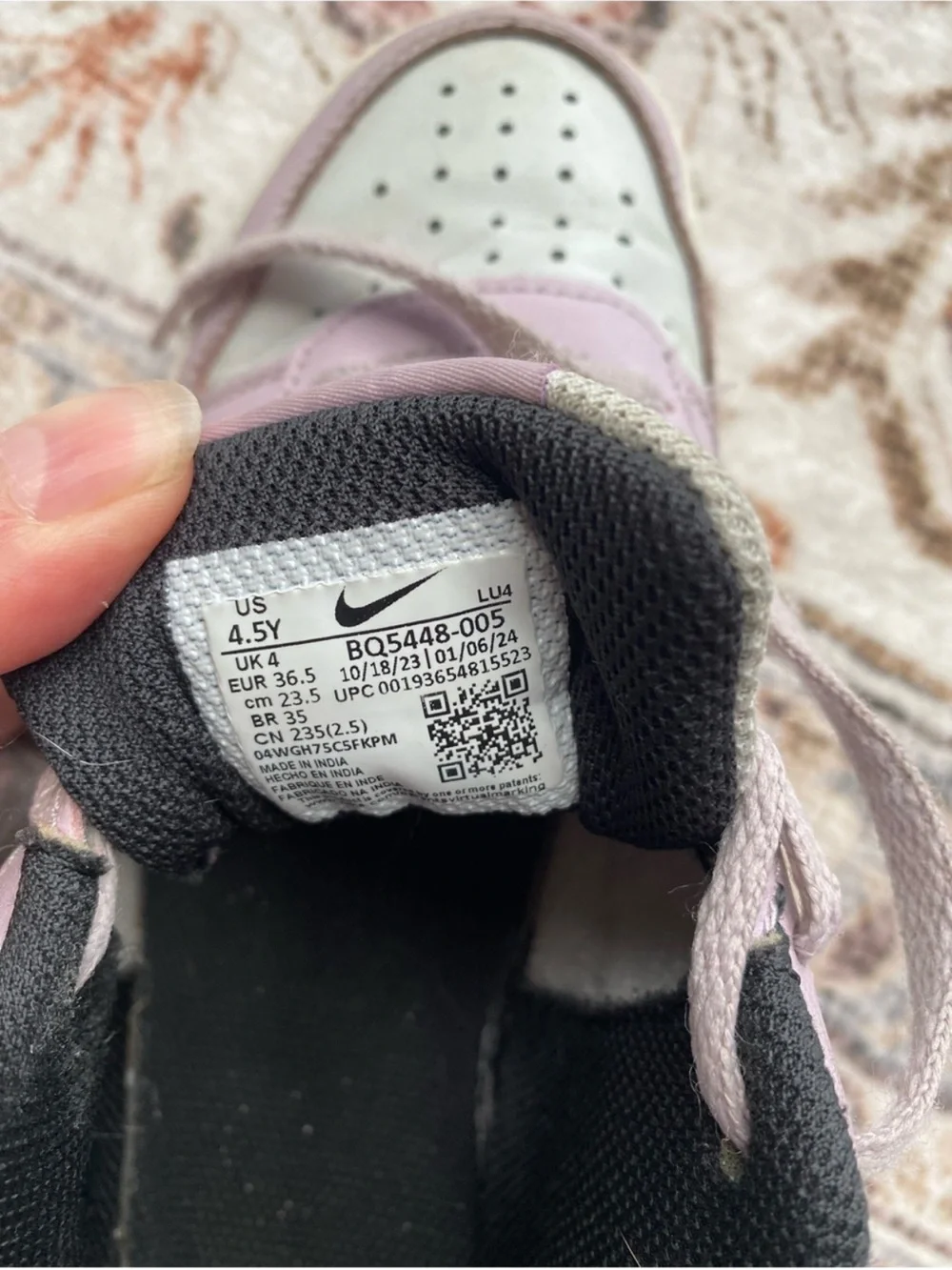 Nike Low-Top Sneakers in Light Pink, White and Black Swoosh